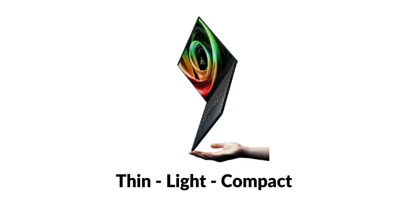 A Slim Dark Laptop Razer Blade Is Held Aloft By A Hand Demonstrating Its Portability. Text Below Reads Thin Light Compact