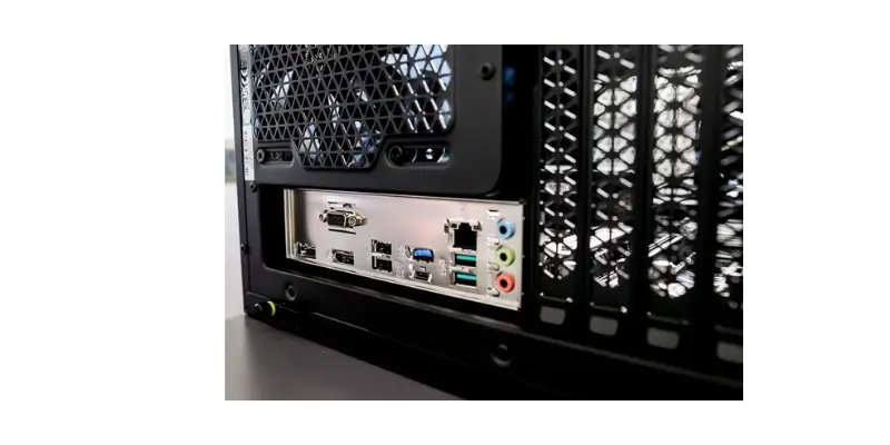 A Close Up View Of A Computer Cases Rear Io Inputoutput Shield Showing Ports For A Motherboard Including Usb Ethernet Audio Jacks And A Legacy Vga Connector