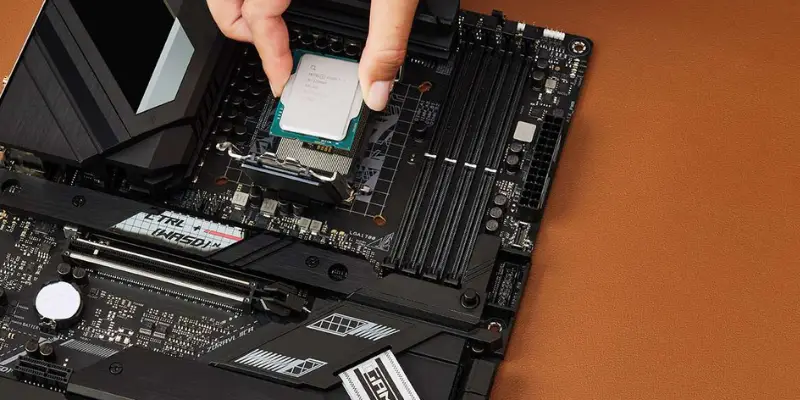 A Hand Gently Lowering A Cpu Chip Into The Socket On The Motherboard